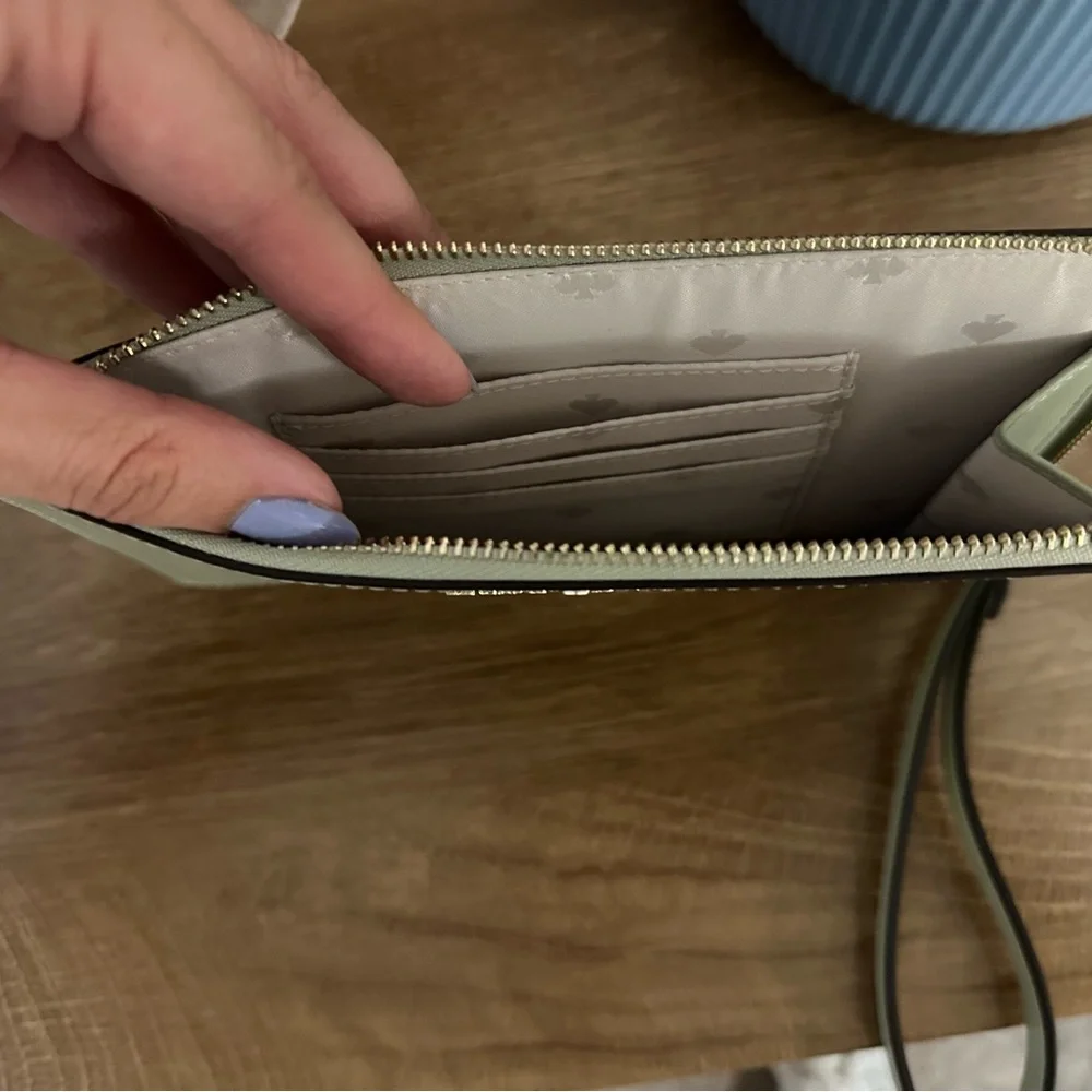 kate spade Pale Green Leather Wristlet with Black Strap
